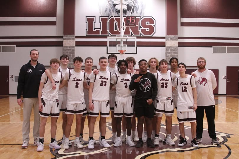 Boys basketball District Champs 2026